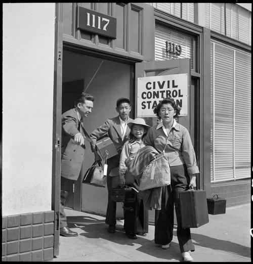 Oakland, California. Part of family unit of Japanese ancestry leave Wartime Civil Control Administr . . .