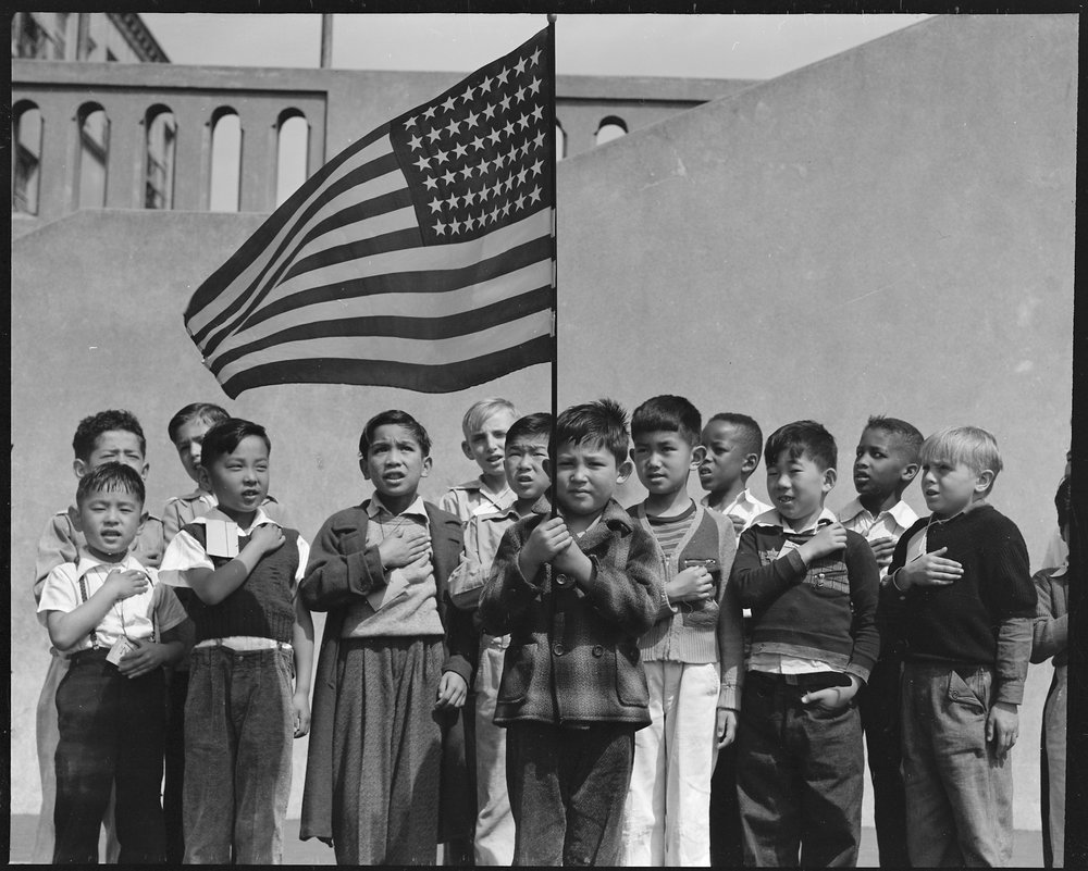 San Francisco, California. Flag of allegiance pledge at Raphael Weill Public School, Geary and Buch . . .