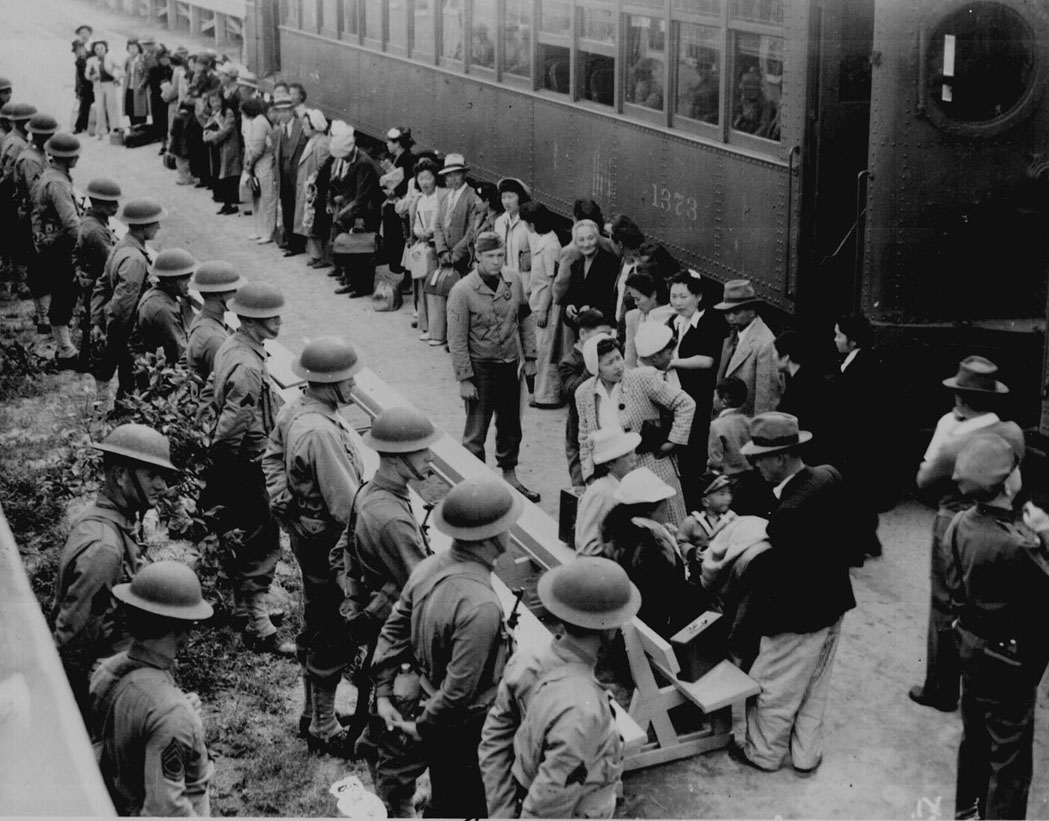 Japanese American being placed on trains just like what happened to Jews in Europe